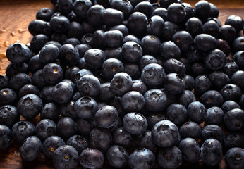 blueberries on wooden background