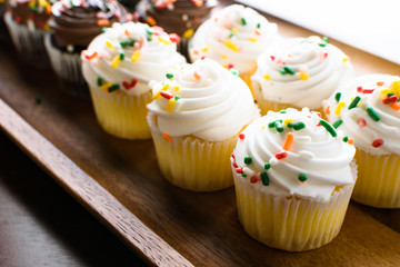 cupcakes with sprinkles - Powered by Adobe