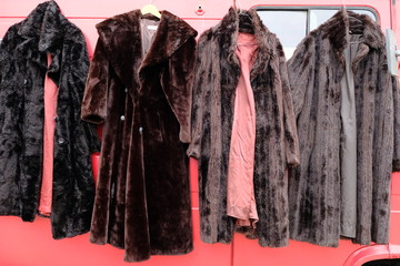 fur coats on the flea market