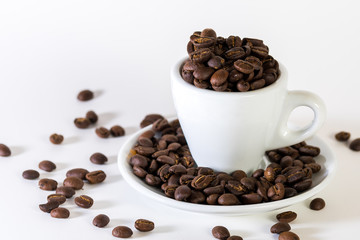 Coffee or espresso cup with coffee beans plain white background