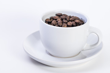 Coffee or espresso cup with coffee beans plain white background