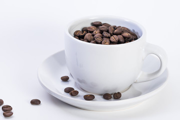 Coffee or espresso cup with coffee beans plain white background