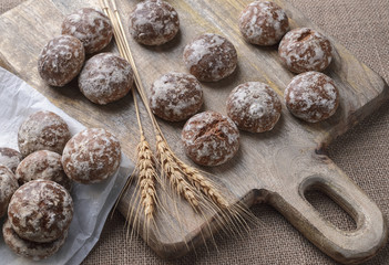 Vanilla gingerbread on a wooden background