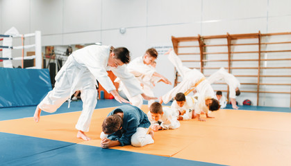 Kid judo, childrens in kimono training martial art