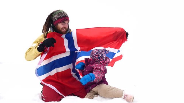 Norwegian fans family with national flag. Winter sports competitions
