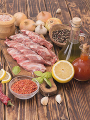 pork ribs on a wooden board. 