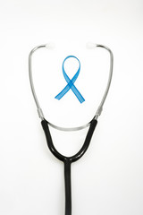 Health protection concept, prostate cancer, stethoscope and blue ribbon