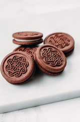 Sandwich cocoa cookie with crema inside