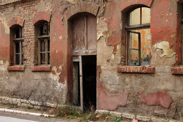 Fototapeta na wymiar Facade of old abandoned building near Sarajevo , Bosnia and Herzegovina