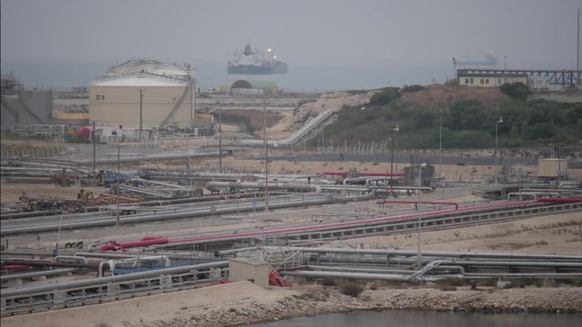 Crude oil tanker behind the terminal facilities