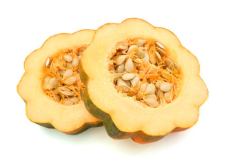 Two slice of an acorn squash on white