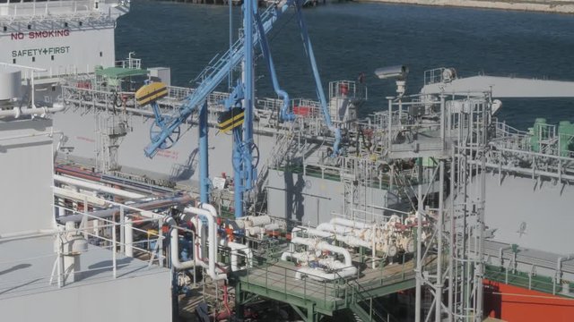 LPG tanker loading alongside jetty