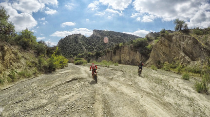 Fototapeta na wymiar Enduro journey with dirt bike high in the mountains