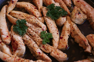 appetizing chicken strips freshly prepared and well spiced