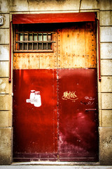 red textured door in Barcelona Spain