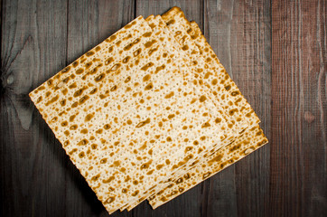 traditional Jewish kosher matzo for Easter pesah on a wooden table. Jewish Easter food