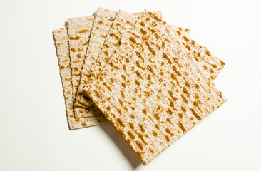 traditional Jewish kosher matzo for Easter pesah on a wooden table. Jewish Easter food. Spring.