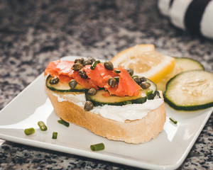 Lox and Cream Cheese with Capers, a Slice Cucumber and a Squeeze of Lemon