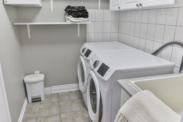 laundry. A washing and dryer machine at home