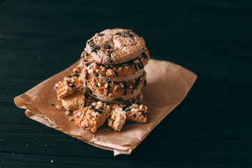 Chocolate chip cookies on dark old wooden table with place for text., freshly baked. Selective Focus with Copy space.