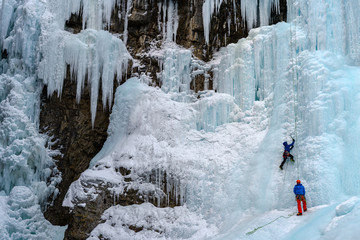 Ice Climbers on the frozen waterfalls in Johnston Canyon, Banff National Park, Alberta, Canada