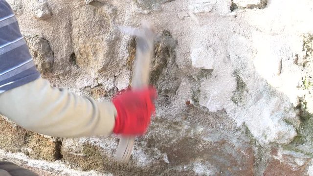 Restoration work in Temple for wall