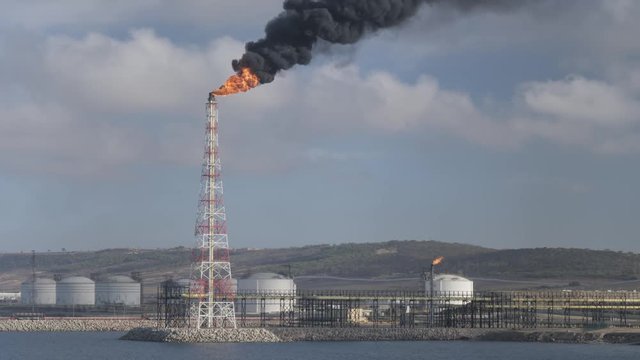 Flare stack and smoke of petrochrmical refinery