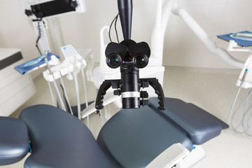 professional dental microscope in a modern light dental office