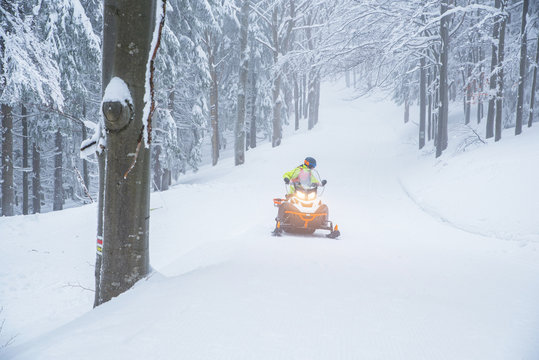 Man on snowmobile, sport photo, wonderful winter nature
