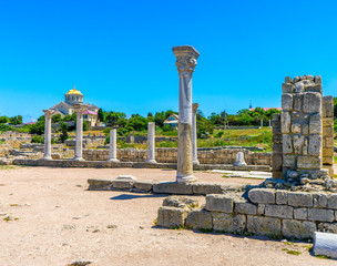 Fototapeta premium The ruins of the ancient basilica and the new Vladimir Cathedral in the ancient city of Chersonese on the Black Sea coast in Sevastopol in the Crimea in Russia