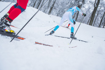 Cross-country skiing: young woman cross-country skiing on a snowy winter day