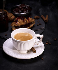 ceramic white cup with black coffee