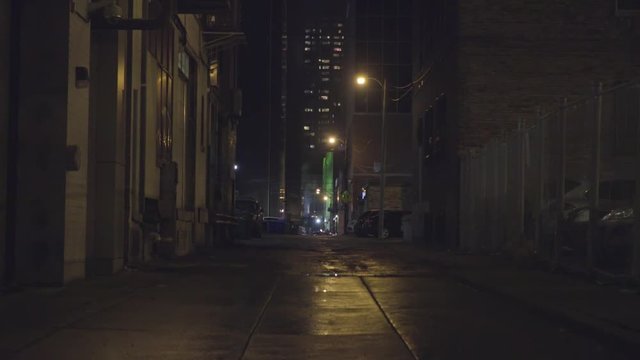 Dark alleyway at night after the rain