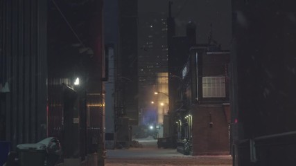 Dark winter alleyway with mysterious futuristic glowing building