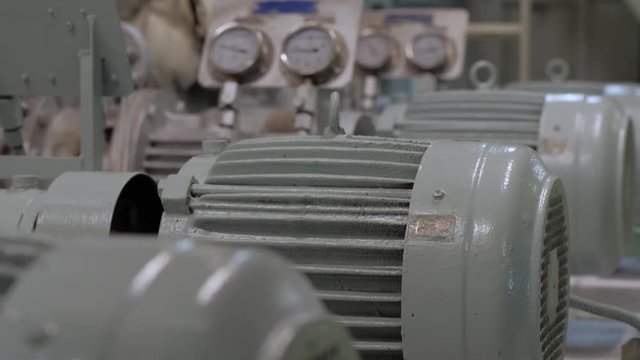 Manometers on pump with electric motor