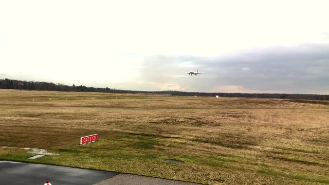 Final approach of passenger aircraft in cologne, Germany