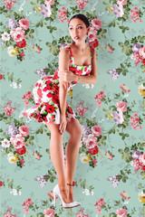 Model posing in colorful dress