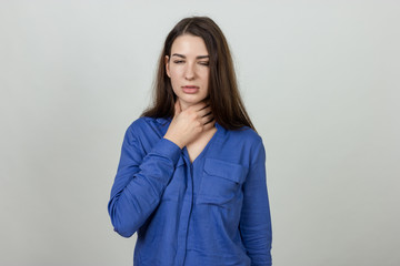 Young woman with sore throat
