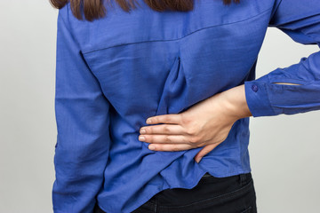  Pretty woman suffers from backache