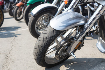 motorcycles on parking on asphalt