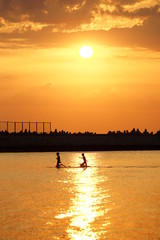 The sun leans towards the horizon in the Baltic sea