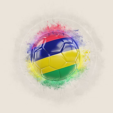 Grunge football with flag of mauritius
