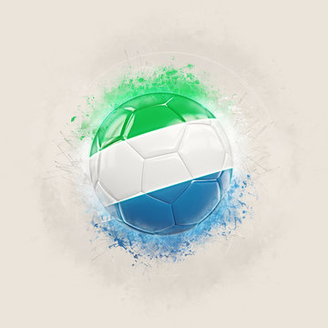 Grunge football with flag of sierra leone