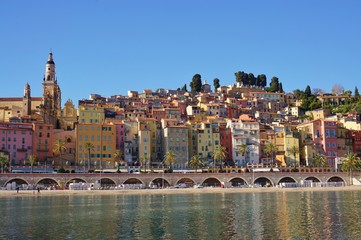 Fototapeta premium Landscape view of the colorful French Riviera city of Menton in the Alpes Maritimes seen from the Mediterranean Sea