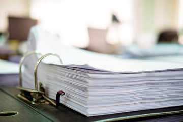 Close up paper stack on the desk related to business functions.Stack of business document...