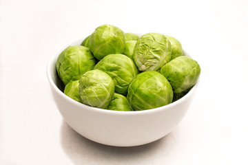 White Ceramic Bowl of Fresh Green Brussesl Sprouts