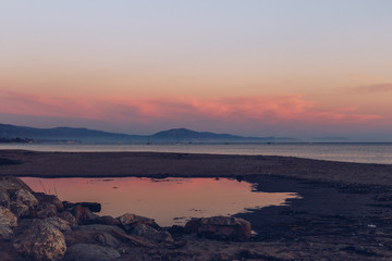 Beautiful Sunset at the Beach in Santa Barbara with Clouds and Mountains