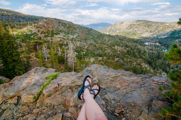 Girl Wearing Sandals Looking at the Mountains