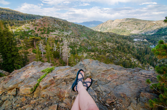 Girl Wearing Sandals Looking at the Mountains