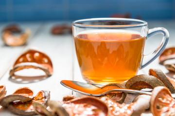 Bael tea juice on wooden table , healthy drink
